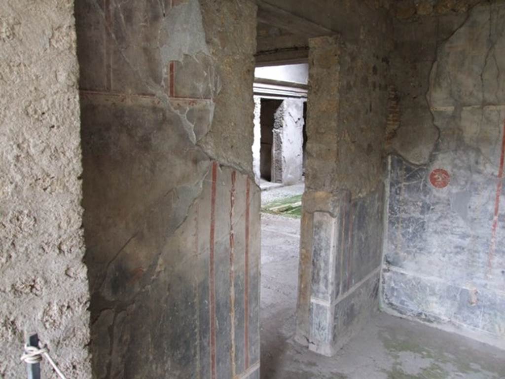 IX.13.1-3 Pompeii. March 2009. Room 15, east wall with doorway to room 14.