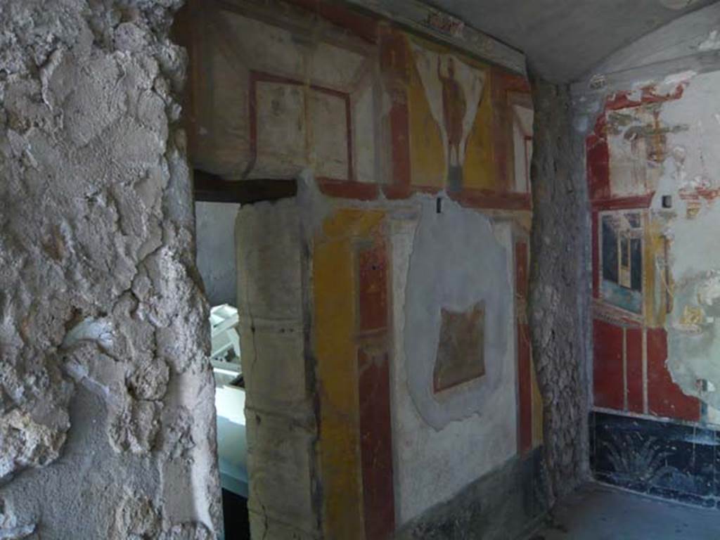 IX.13.1-3 Pompeii. May 2012. Room 17, east wall. Photo courtesy of Buzz Ferebee.


