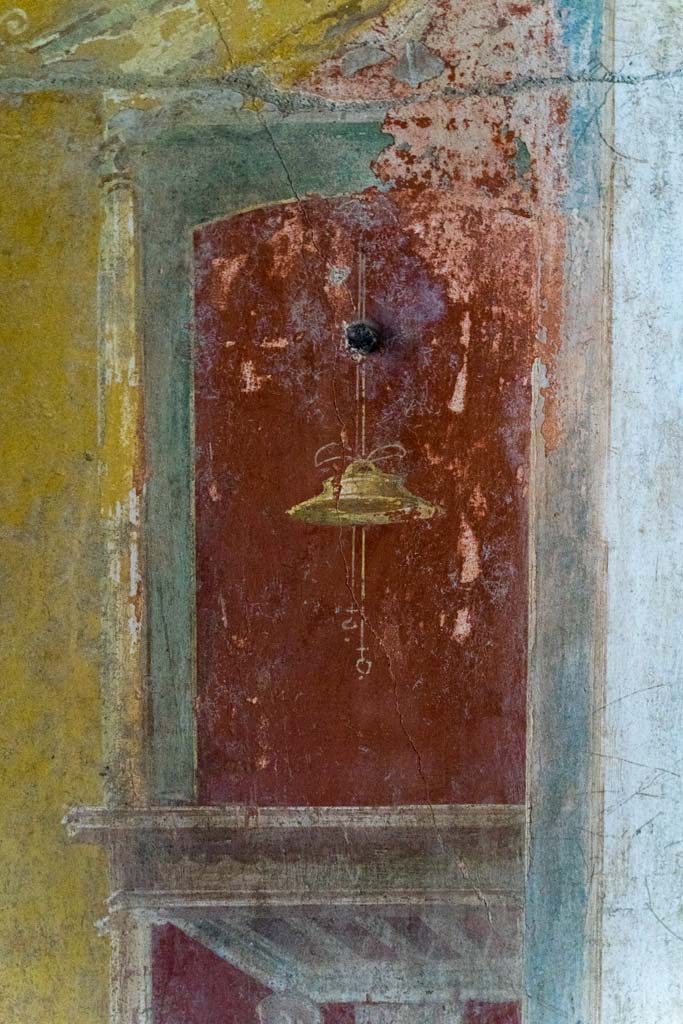 IX.13.3 Pompeii. October 2021. Room 17, detail from east wall. Photo courtesy of Johannes Eber.