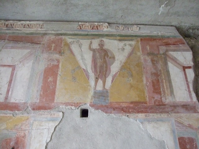 IX.13.1-3 Pompeii. May 2012. Room 17, remains of mythological painting on east wall.
Photo courtesy of Buzz Ferebee.

