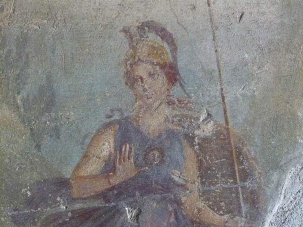 IX.13.1-3 Pompeii. May 2012. Room 17, detail of Minerva from mythological wall painting on west wall.  Photo courtesy of Buzz Ferebee.

