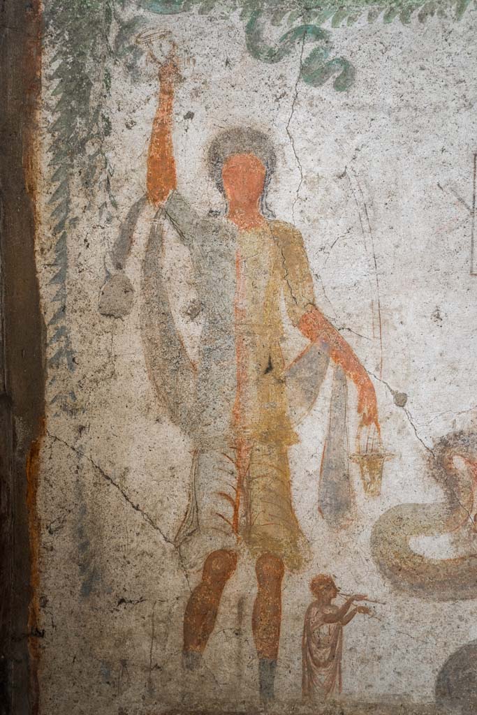 IX.13.1-3 Pompeii. October 2021. 
Room 21, detail from lararium. Photo courtesy of Johannes Eber.
