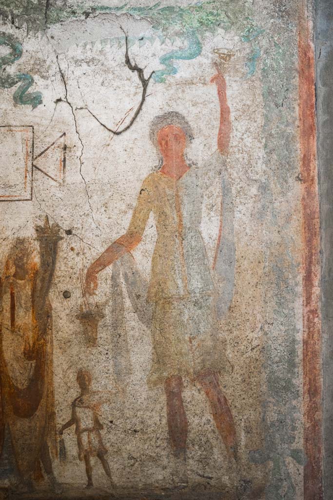 IX.13.1-3 Pompeii. October 2021. 
Room 21, detail from lararium. Photo courtesy of Johannes Eber.
