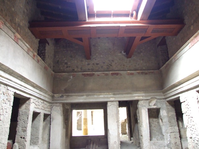 IX.13.1-3 Pompeii. March 2009. Room 2, upper north wall of atrium.