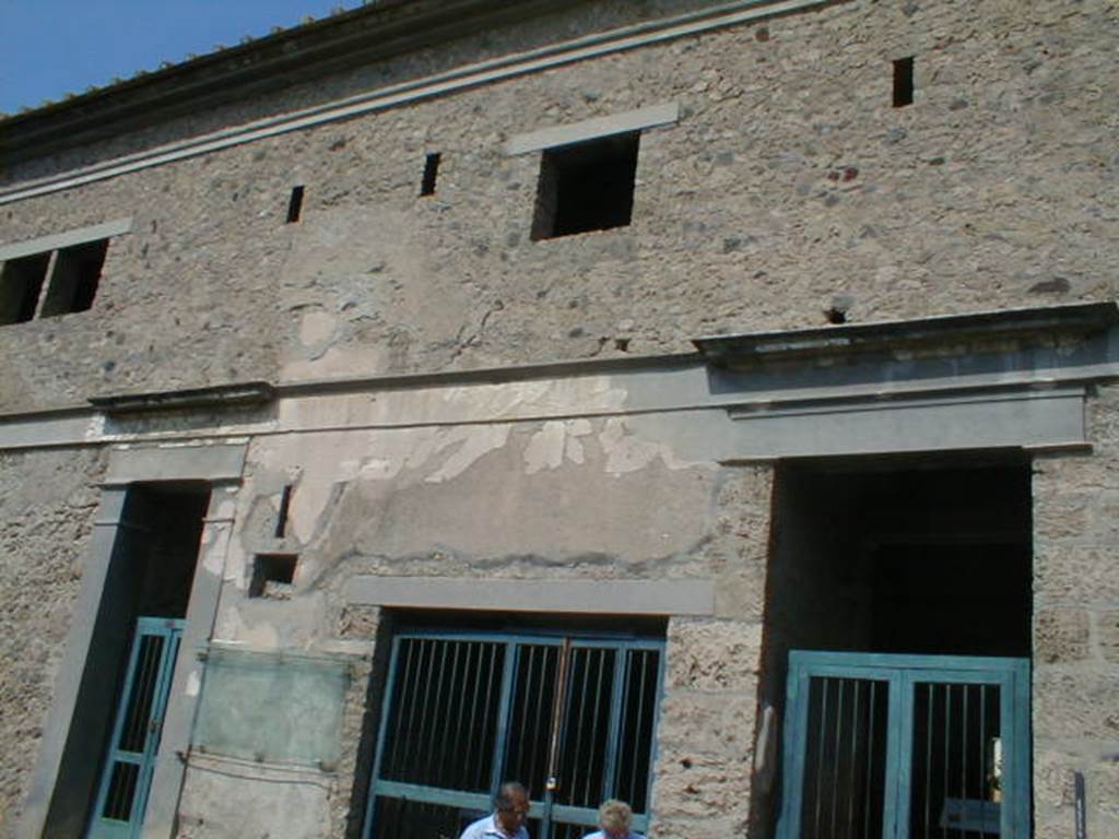 IX.13.1-3 Pompeii. September 2004, façade of  upper south side of IX.13.1-3 