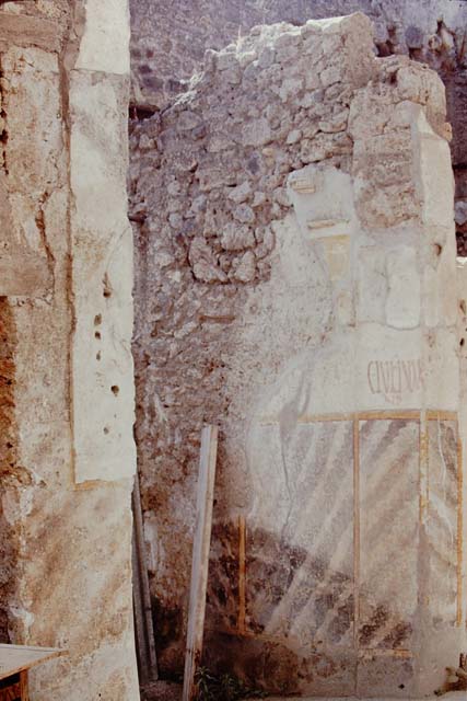 IX.13.1-3 Pompeii. March 2009. Room 1, upper south wall. Doorways of IX.13.3 and IX.13.2.

