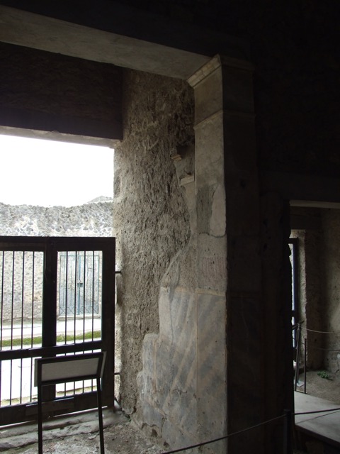 IX.13.1-3 Pompeii. March 2019. Looking north from entrance doorway, detail of west wall. 
Foto Taylor Lauritsen, ERC Grant 681269 DÉCOR.

