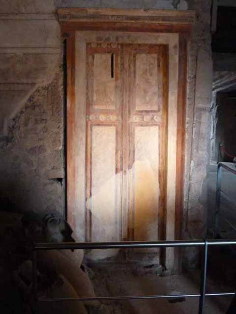 IX.13.1-3 Pompeii. March 2009. Room 1, painted false door in north wall.