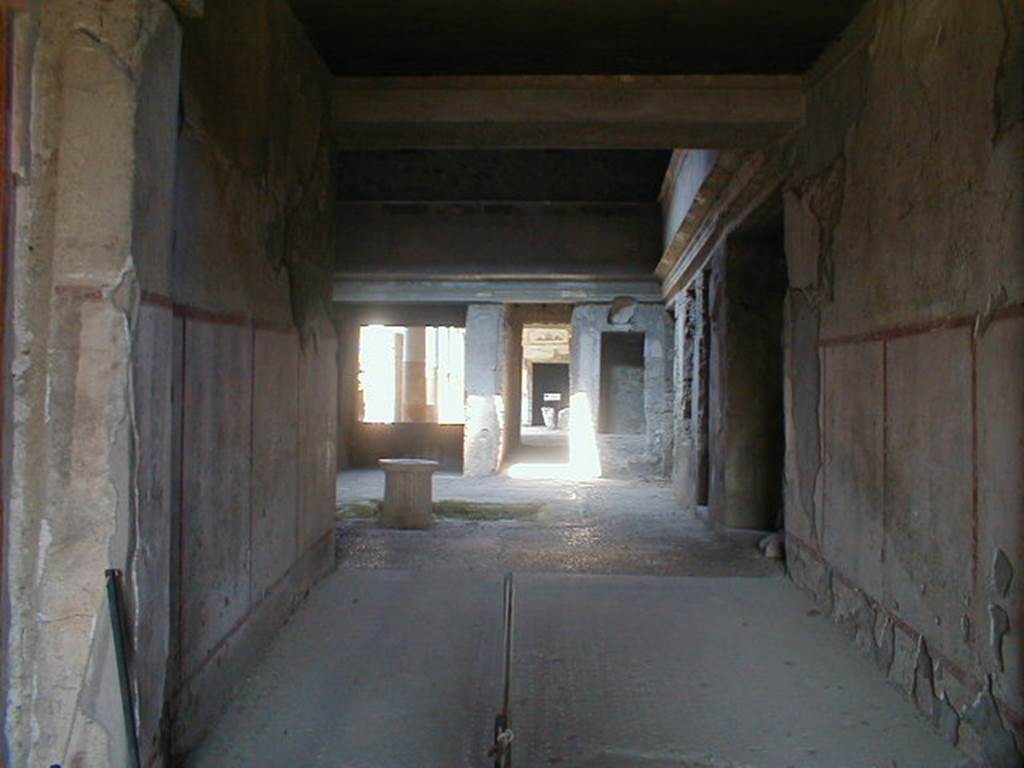 IX.13.1-3 Pompeii. September 2004. Room 28, looking north to room 2, atrium.
