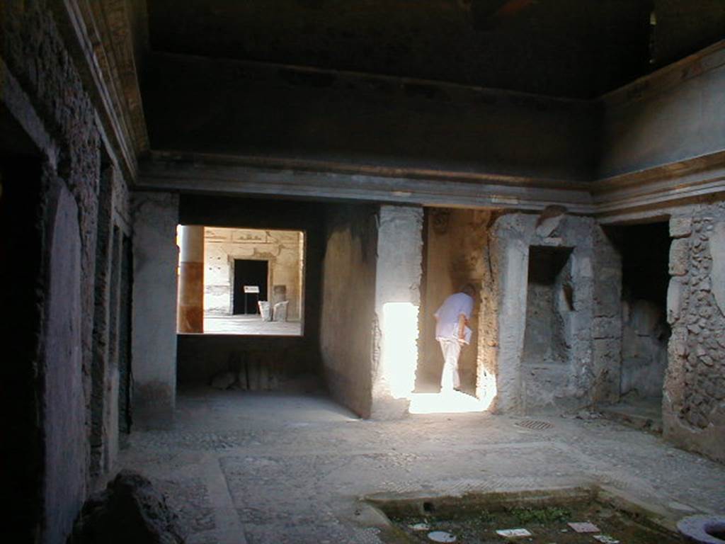 IX.13.1-3 Pompeii. September 2004. Room 2, atrium. Looking north.