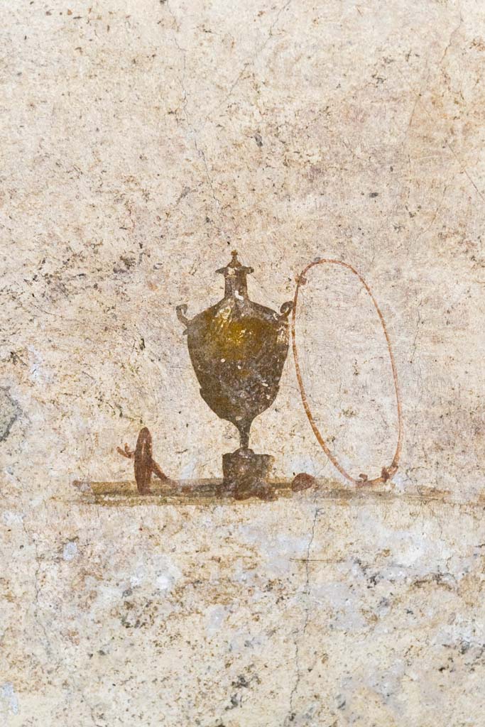 IX.13.3 Pompeii. October 2021. 
Room 9, east portico, decoration on east wall. Photo courtesy of Johannes Eber.

