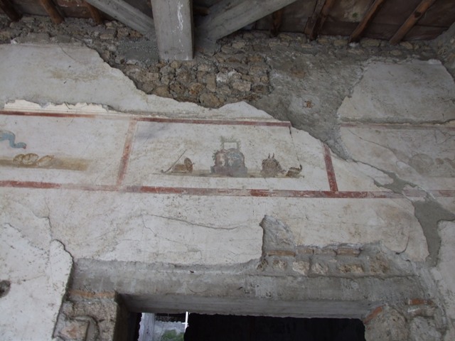 IX.13.1-3 Pompeii. March 2009. Room 9, wall above room 9 doorway..
