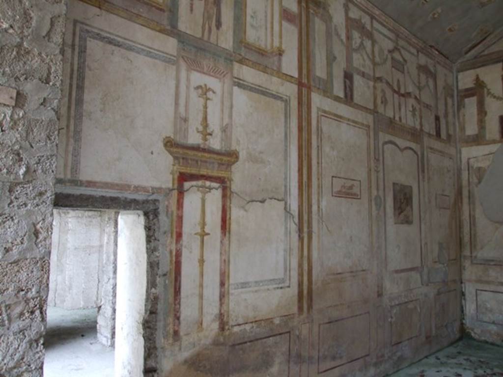 IX.13.1-3 Pompeii. March 2009. Room 11. West wall with doorway to antechamber of room 12.