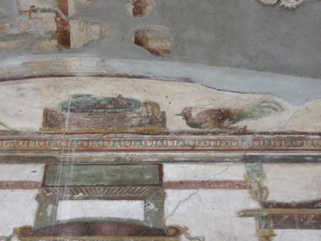IX.13.1-3 Pompeii. March 2009. Room 11, upper north wall.  Architectural painting with bird (cockerel?) and plate with food. 