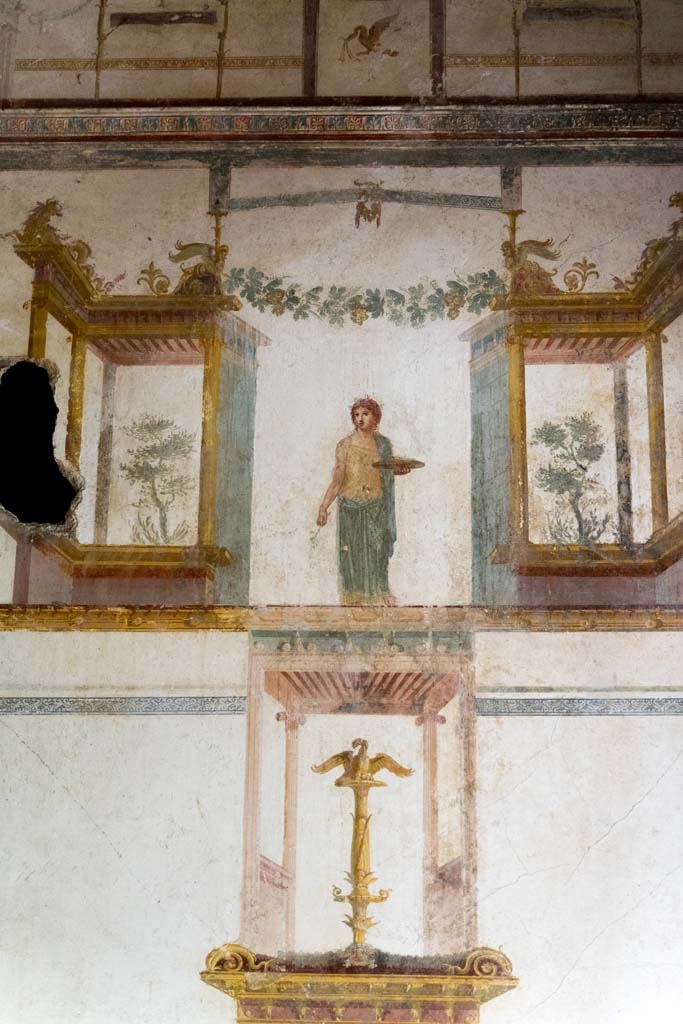 IX.13.1-3 Pompeii. October 2021. 
Room 11, detail from south end of east wall. Photo courtesy of Johannes Eber.


