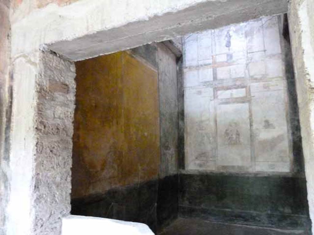 IX.13.1-3 Pompeii. May 2010.  Room 12, west wall.