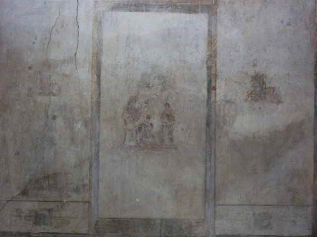 IX.13.1-3 Pompeii. May 2010. Room 12, detail from north wall of paintings in three panels. 

