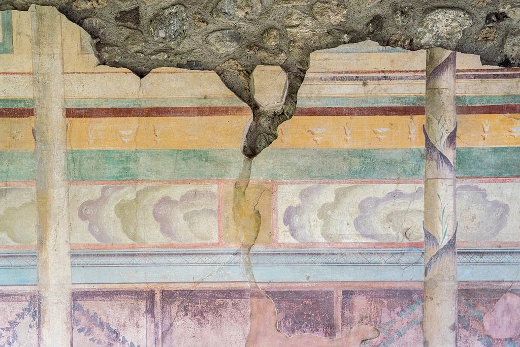 IX.14.4 Pompeii. July 2024. Tablinum, detail of upper centre of west wall. Photo courtesy of Johannes Eber.