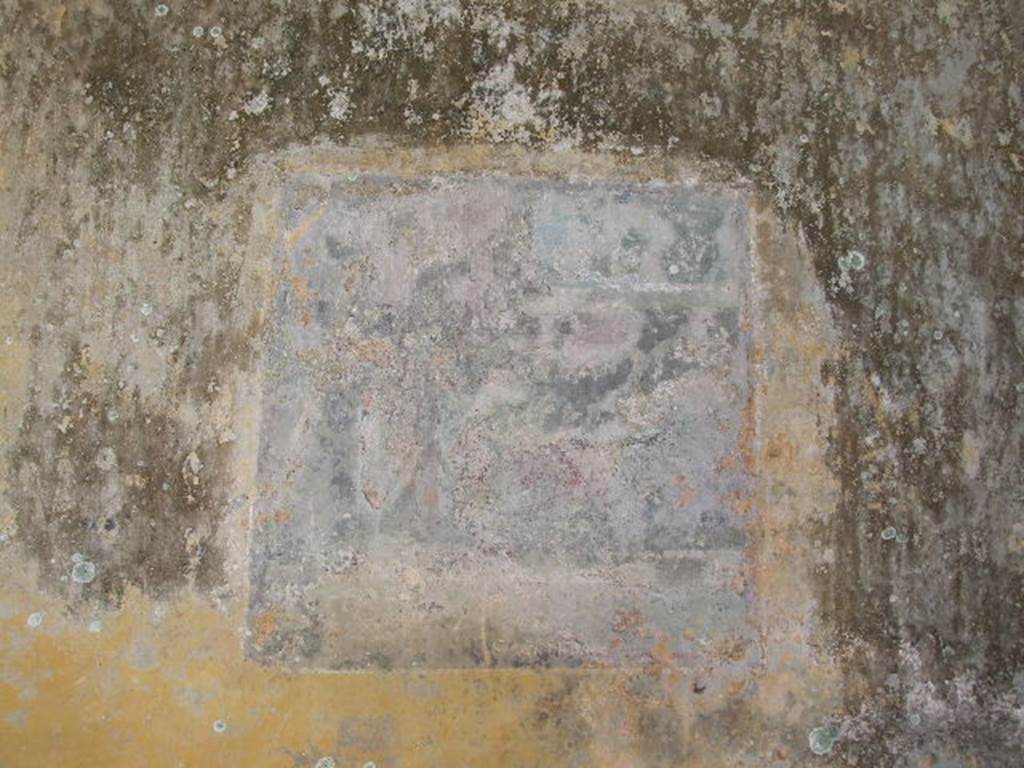 HGW24 Pompeii. December 2006.
Remains of wall painting in centre of east wall of one of the richly decorated living rooms on the eastern side of the garden. 
(Fontaine, room 5,7).
