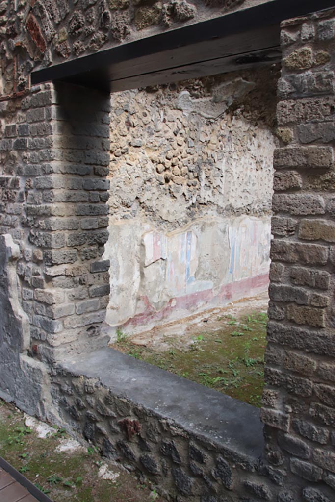 Villa of Diomedes, Pompeii. October 2023. 
Looking north-east through window from east portico. Photo courtesy of Klaus Heese.
(Villa Diomedes Project – area 53).
(Fontaine, room 5,5).
