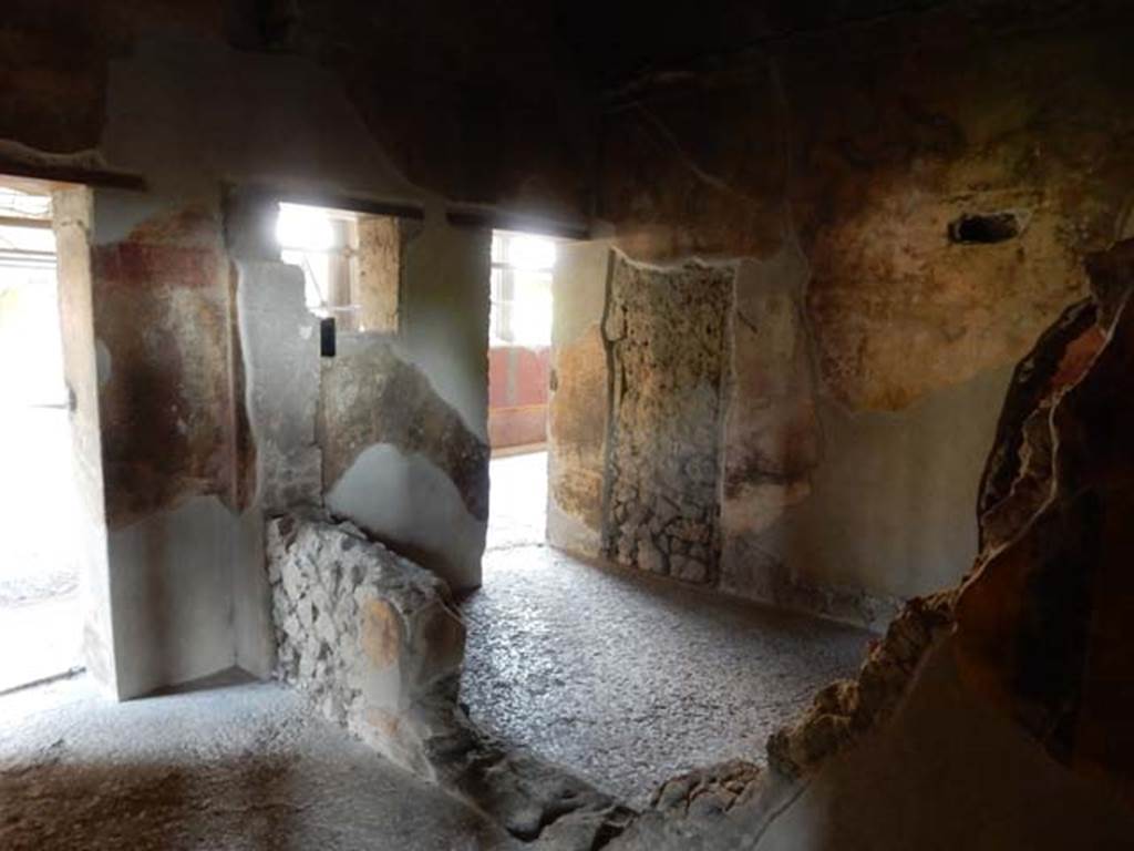 Villa of Mysteries, Pompeii. May 2015. Room 21, on left, and doorway from room 20 on right.  Looking south-east towards east wall with doorways to peristyle A from both rooms. Photo courtesy of Buzz Ferebee.
