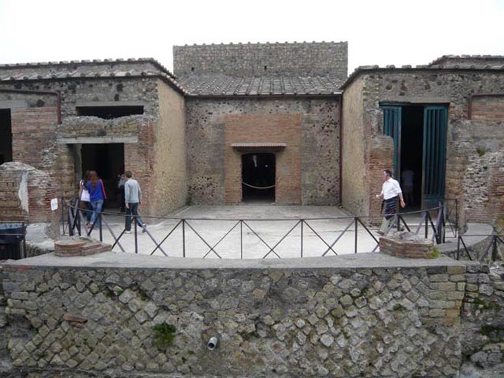 Villa of Mysteries, Pompeii. May 2012. 
Looking east across remains of exedra towards room 1, and doorway into tablinum,2. 
On the right is the doorway into the portico P2, rooms 4 and 5. Photo courtesy of Buzz Ferebee.

