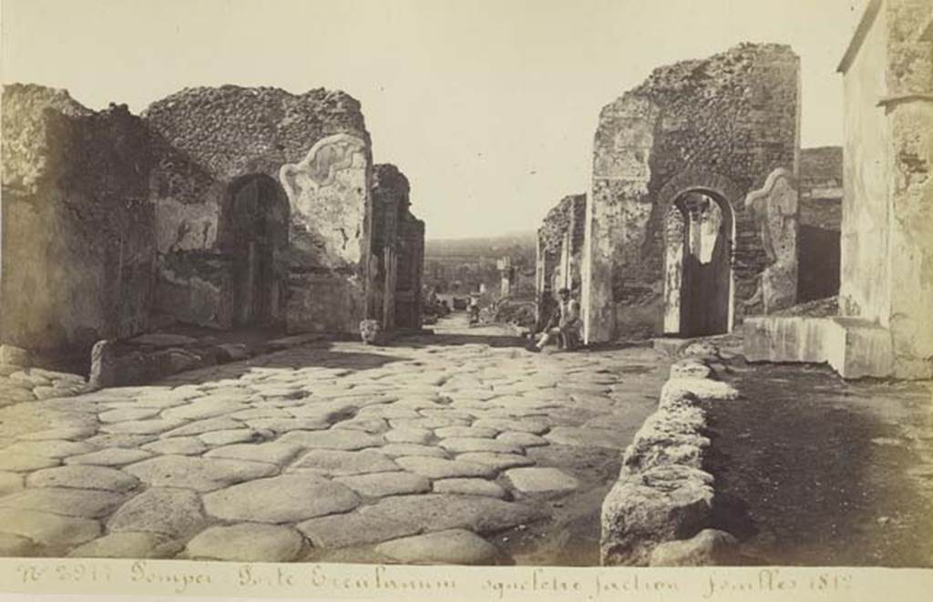 Via Consolare between VI.17 and VI.1. Old undated photograph by Amodio no. 2977, album dated c.1873. Looking north to Herculaneum Gate. Photo courtesy of Rick Bauer.
