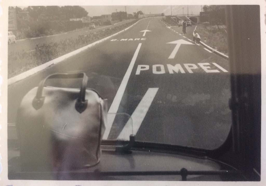 Pompeii, 1954. “If coming by road, follow the road-signs”. Photo courtesy of Rick Bauer.
