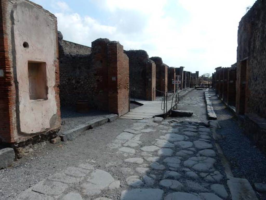 Via degli Augustali between VII.4 and VII.9. May 2015. Looking east from near VII.4.16/17. Photo courtesy of Buzz Ferebee.
