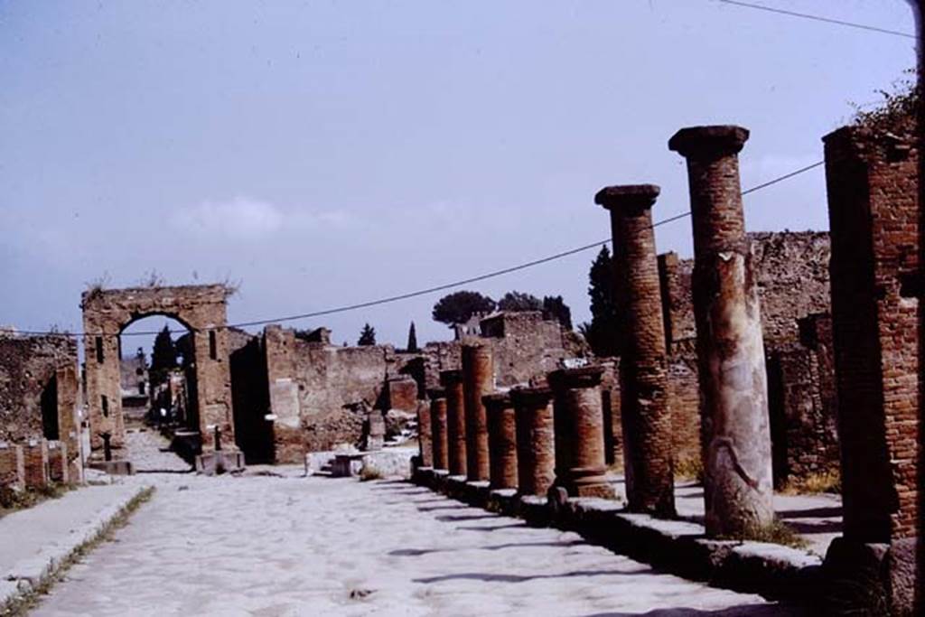 Via del Foro, Pompeii. 4th December 1971. Looking north to Arch at junction with Via Mercurio. 
Photo courtesy of Rick Bauer, from Dr. George Fay’s slides collection.
