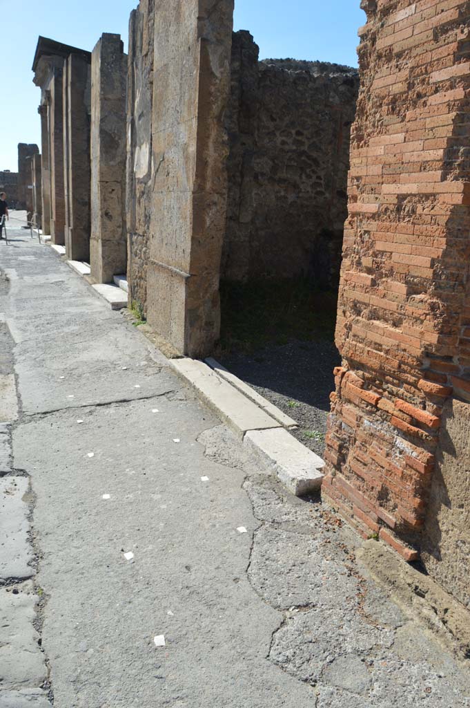 Via della Fortuna, Pompeii. March 2019. Looking west along pavement from VI.12.6, on right. 
Foto Taylor Lauritsen, ERC Grant 681269 DÉCOR.
