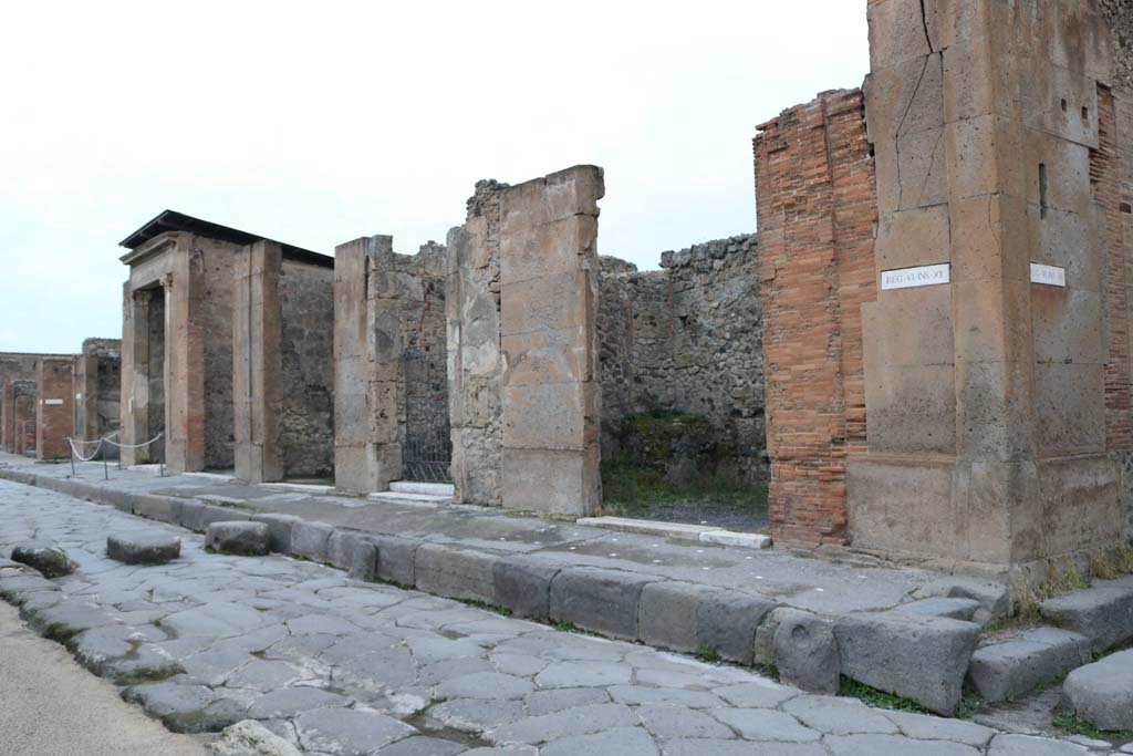 Via della Fortuna, north side. December 2018. 
Looking north-west from VI.12.6, centre right, towards VI.12.1, on left. Photo courtesy of Aude Durand.
