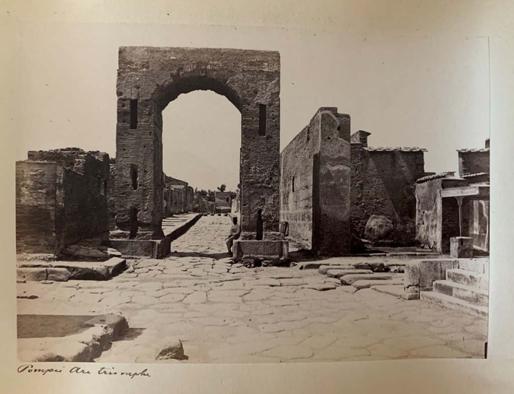 Via di Mercurio at the south end between VI.8 and VI.10. From an album dated April 1878. 
Photograph by M. Amodio. Looking north through arch. Photo courtesy of Rick Bauer.

