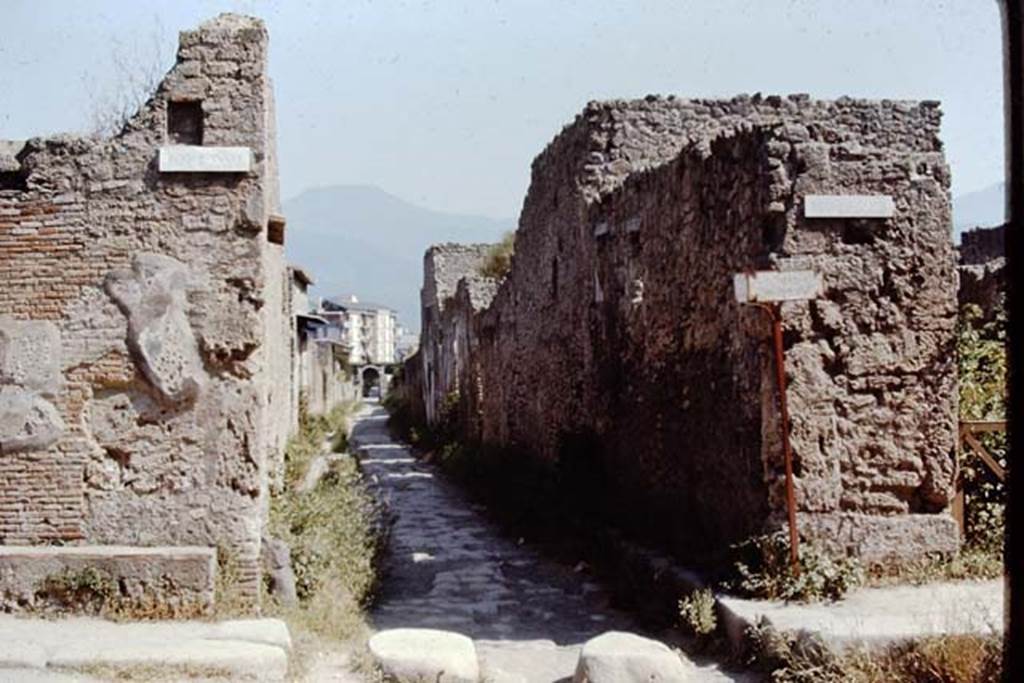 Via di Nocera, Pompeii. 1968. Looking south between II.1 and I.13, from junction with Via dell’Abbondanza. Photo by Stanley A. Jashemski.
Source: The Wilhelmina and Stanley A. Jashemski archive in the University of Maryland Library, Special Collections (See collection page) and made available under the Creative Commons Attribution-Non Commercial License v.4. See Licence and use details.
J68f0351
