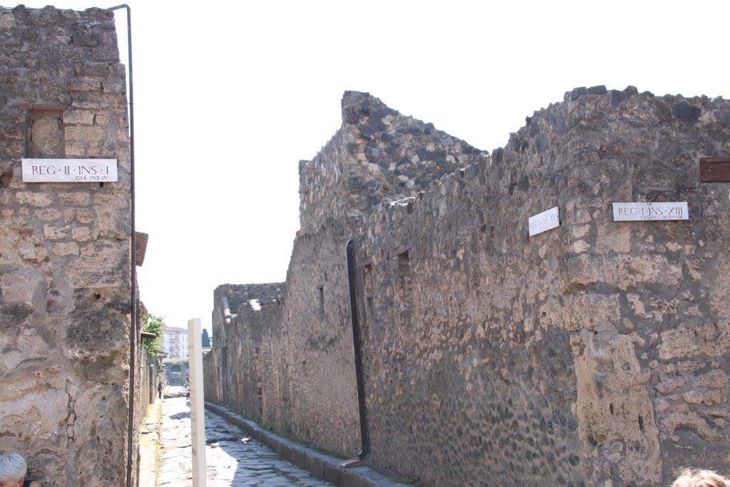Via di Nocera, west side, Pompeii. October 2022. 
Looking south along west side of roadway from junction with Via dell’Abbondanza. Photo courtesy of Klaus Heese. 

