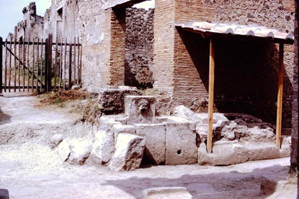 Via di Nocera, west side, Pompeii. 1972. Looking west towards fountain at junction with Via di Castricio.  Photo by Stanley A. Jashemski. 
Source: The Wilhelmina and Stanley A. Jashemski archive in the University of Maryland Library, Special Collections (See collection page) and made available under the Creative Commons Attribution-Non Commercial License v.4. See Licence and use details.
J72f0398
