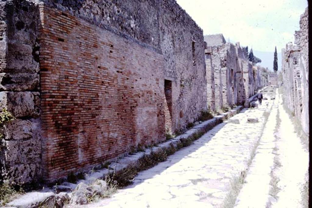 Vicolo dei Vettii, Pompeii, west side. June 2019. Detail of lead water pipes in pavement outside VI.13.13.
Photo courtesy of Buzz Ferebee.
