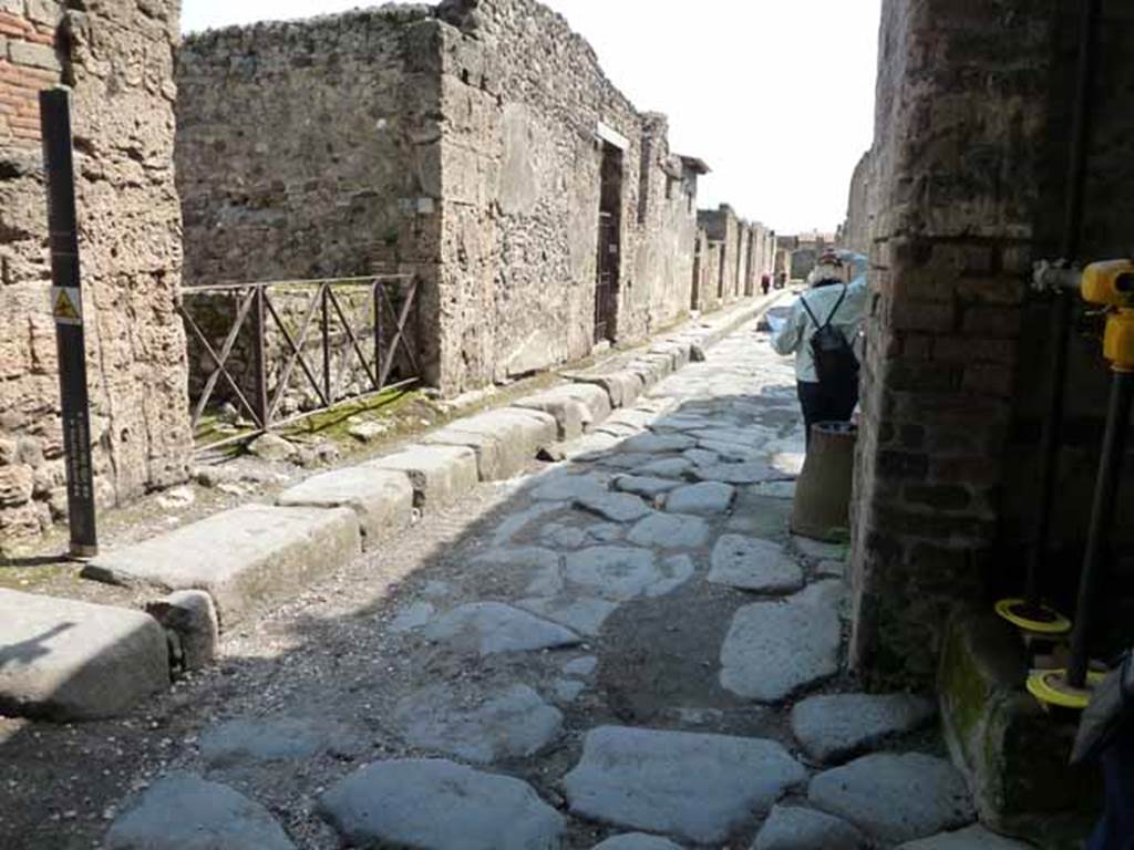 Vicolo di Mercurio. October 2020. Looking towards south-east corner of junction with Vicolo dei Vettii, on right. 
VI.14.36, on right, and VI.14.35, on left. Photo courtesy of Klaus Heese.


