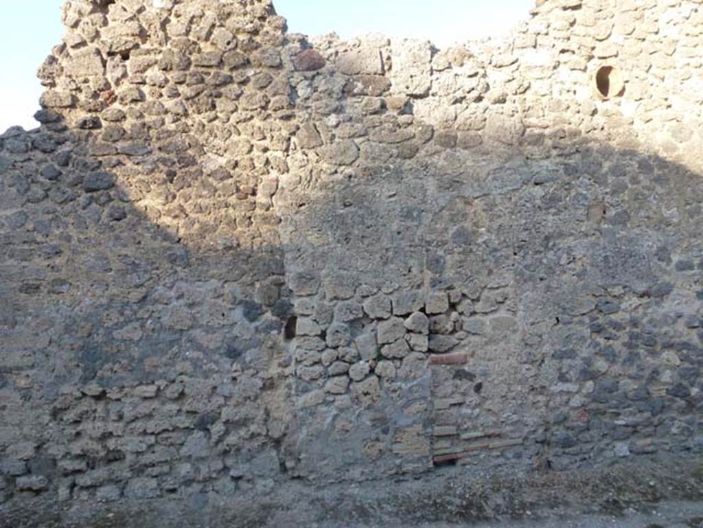 Vicolo di Lucrezio Frontone. June 2012. East side, showing side wall of V.4.1. Photo courtesy of Michael Binns. 