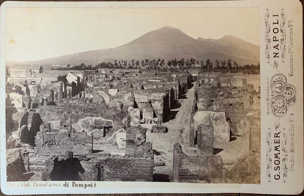 Vicolo di Modesto. c.1872. Looking north from above VII.6.7 (doorway, centre right) towards fountain at junction of Via Consolare with Vicolo di Modesto. 
Sommer cabinet card 5348 panorama di Pompei. Photo courtesy of Rick Bauer.
