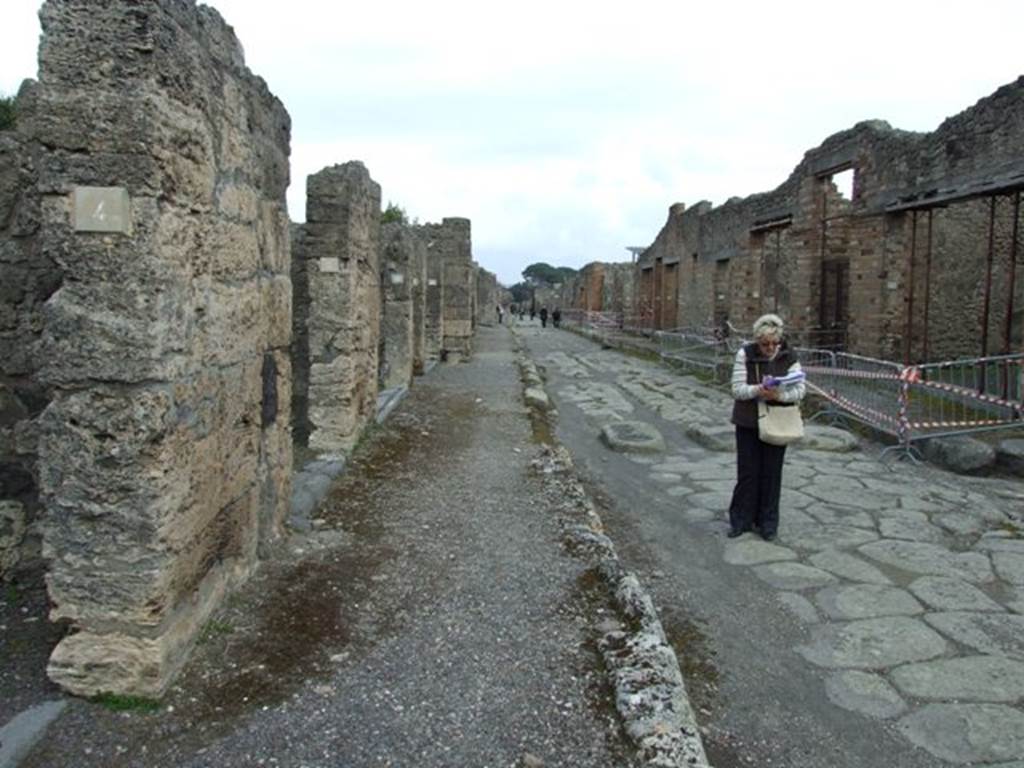 Looking east along Via di Nola. Vicolo di Tesmo is on the right by the red and white tape. March 2009.