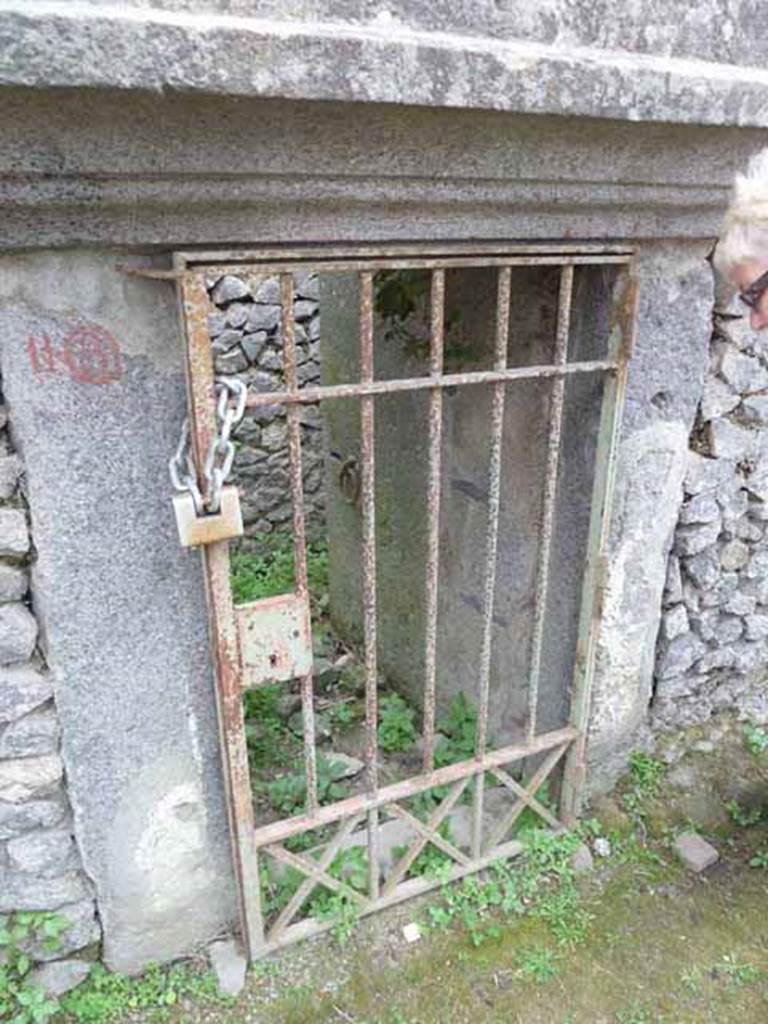 Pompeii Porta Nocera Tomb 11OS. May 2010.
Entrance to the tomb in the middle of the front wall. 
