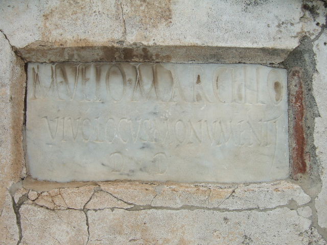 Pompeii VGI. December 2007. Marble plaque with inscription.
