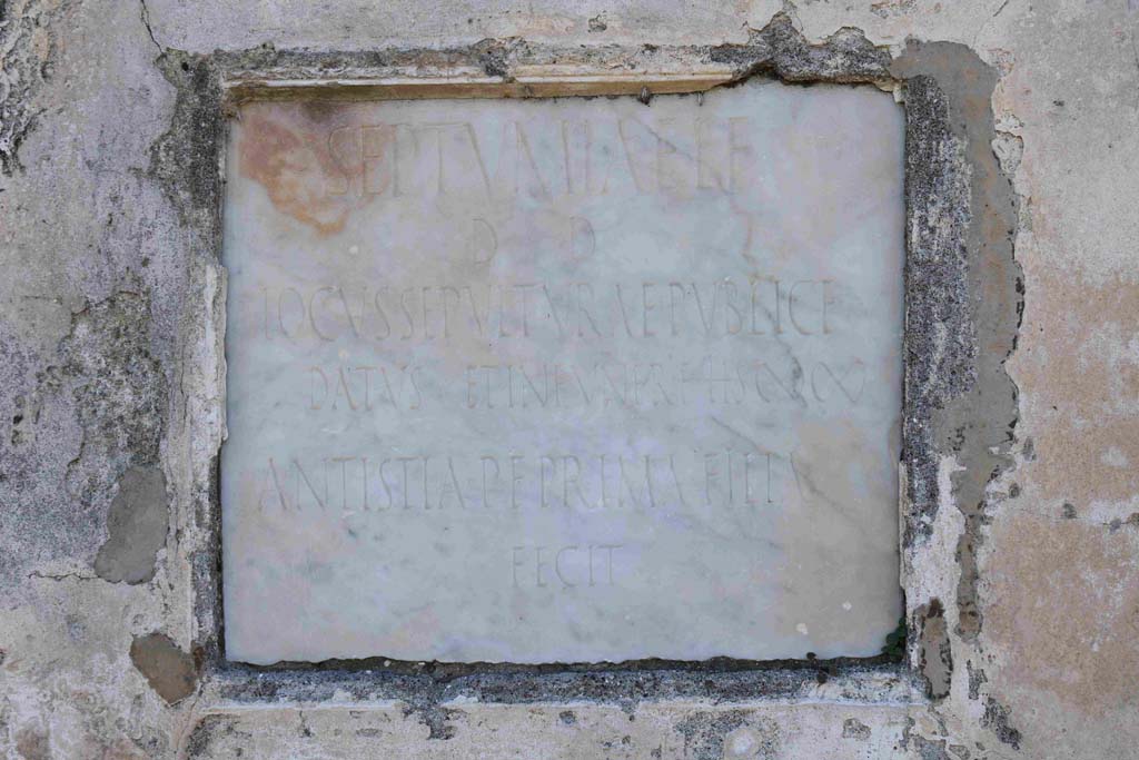 VGL Pompeii. February 2020. Inscribed marble plaque on east side of tomb of Septumia. Photo courtesy of Aude Durand.