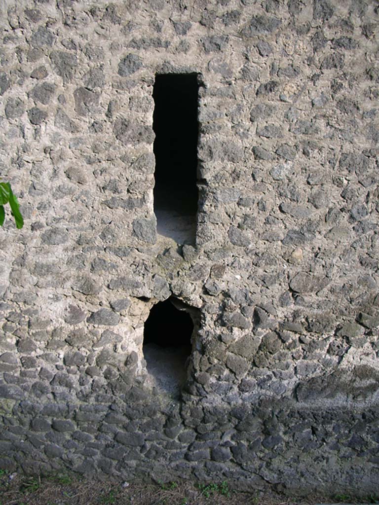 Tower XI, Pompeii. May 2010.  
Detail of arrow slit windows in north wall at east end. Photo courtesy of Ivo van der Graaff.
