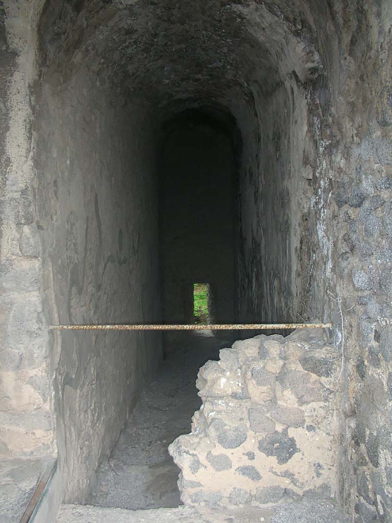 Tower XI, Pompeii. May 2010. Looking north from entrance doorway. Photo courtesy of Ivo van der Graaff.
According to Van der Graaff -
The postern and the stairs heading down to the main chamber of Tower XI was walled up in antiquity in a similar fashion to Tower VIII, but it remains unclear when or why this happened. 
See Van der Graaff, I. (2018). The Fortifications of Pompeii and Ancient Italy. Routledge, (p.135 and Note 104).


