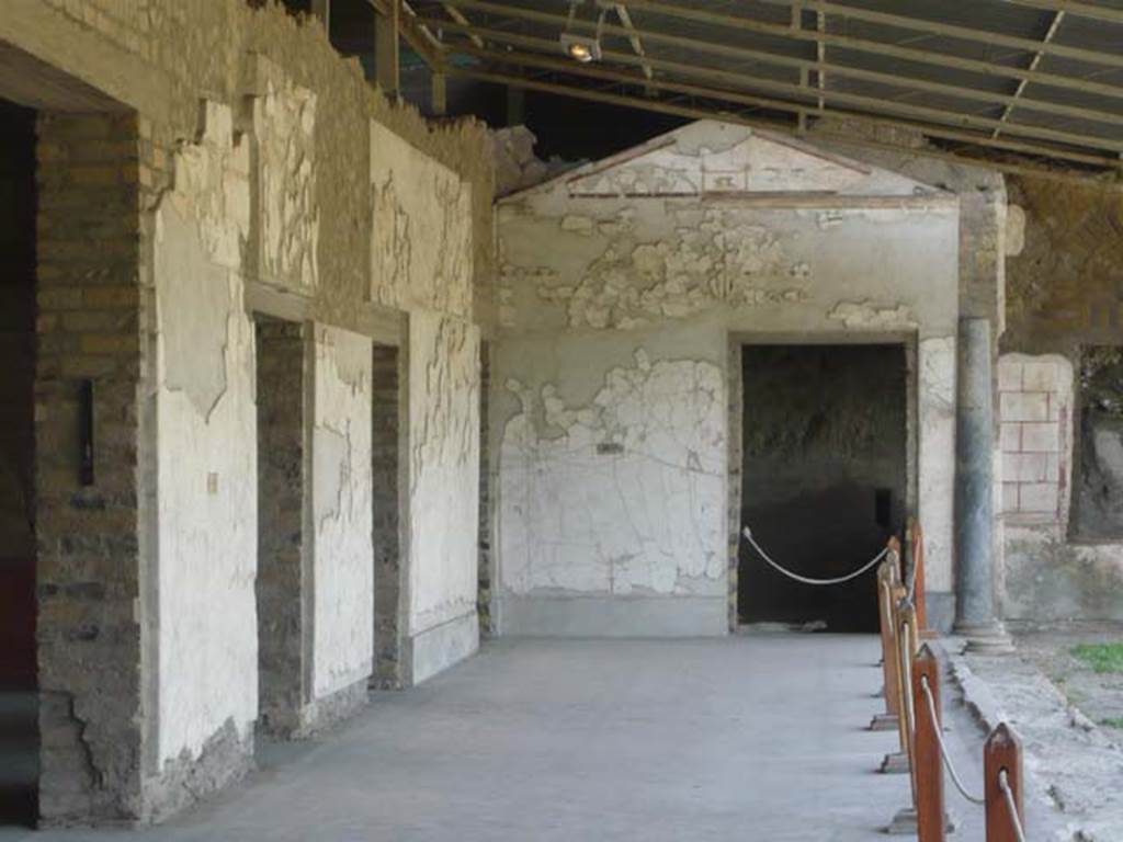 Oplontis, May 2011. Portico 60, looking north. On the left is the doorway to room 74, then 88, 90 and 94. On the right is the doorway and window to room 97.  Photo courtesy of Buzz Ferebee. 
