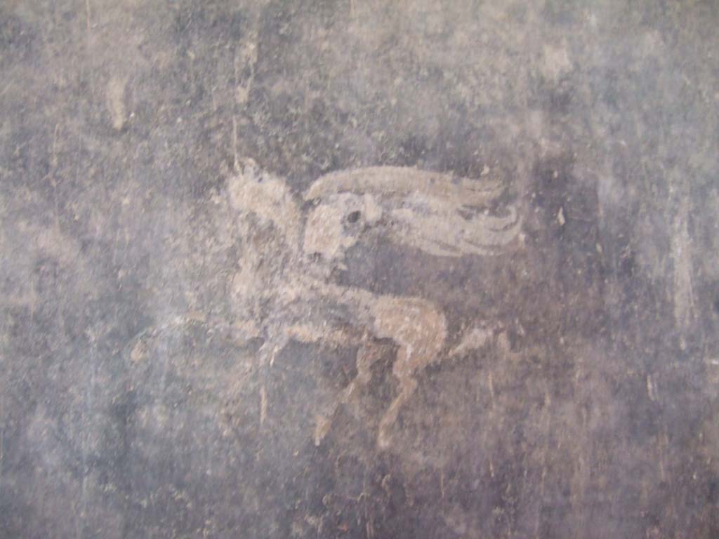 I.10.4 Pompeii. December 2006. Room 17. Painting of winged horse from panel on east wall at south end.