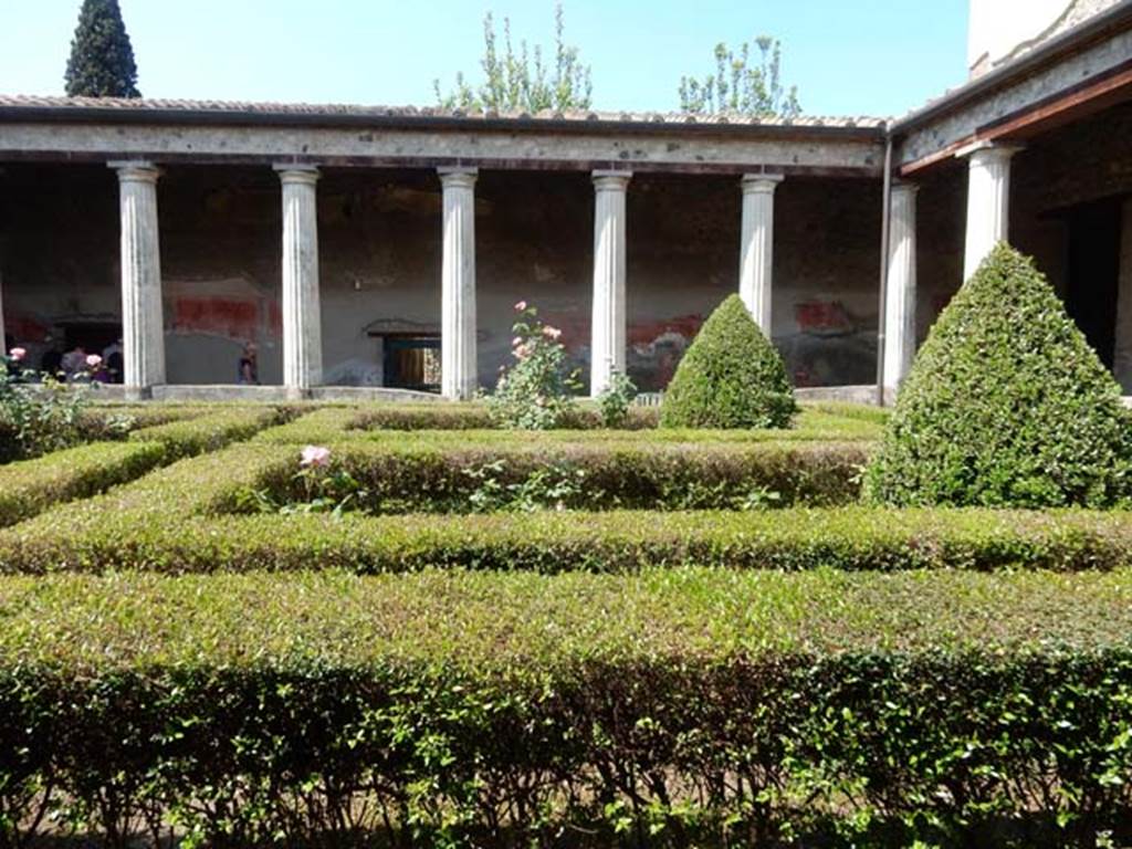 I.10.4 Pompeii. May 2015. Looking west across peristyle area, from near room 15. 
Photo courtesy of Buzz Ferebee.
