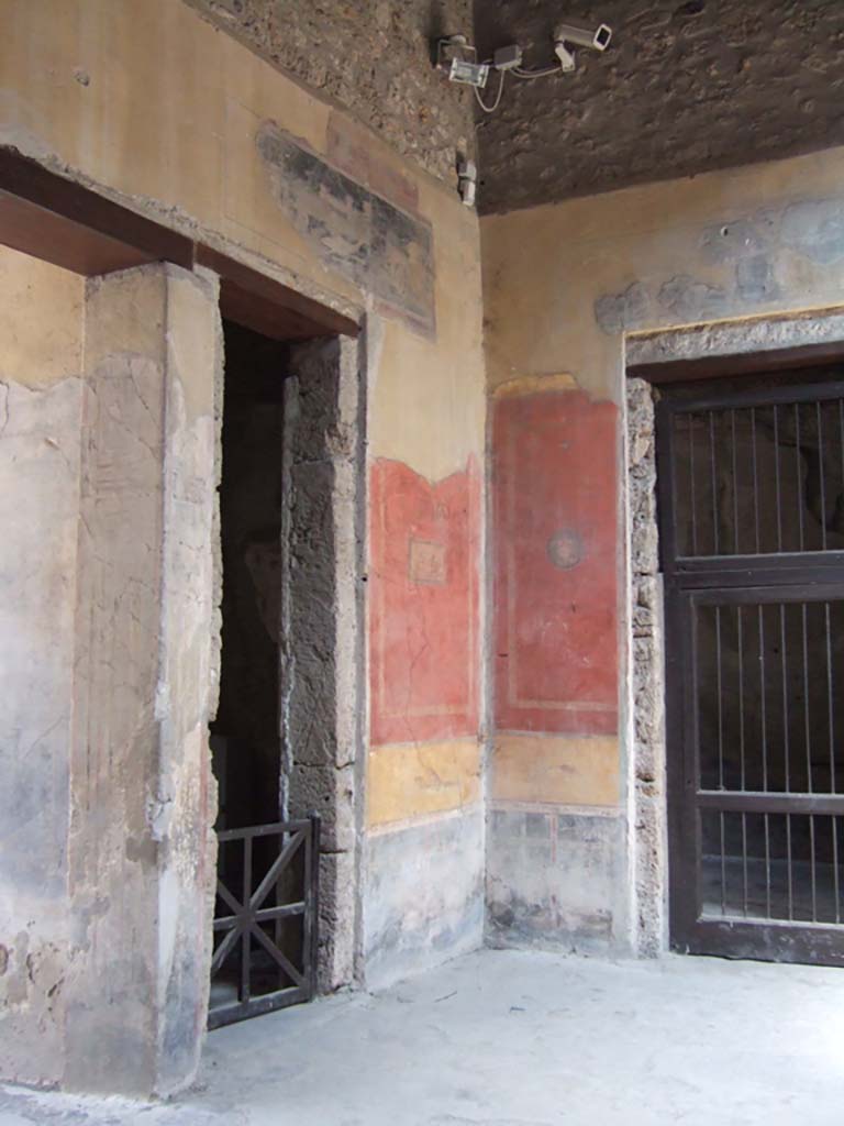 I.10.4 Pompeii. May 2006. North-east corner of atrium, with doorways to rooms 1 and 3.